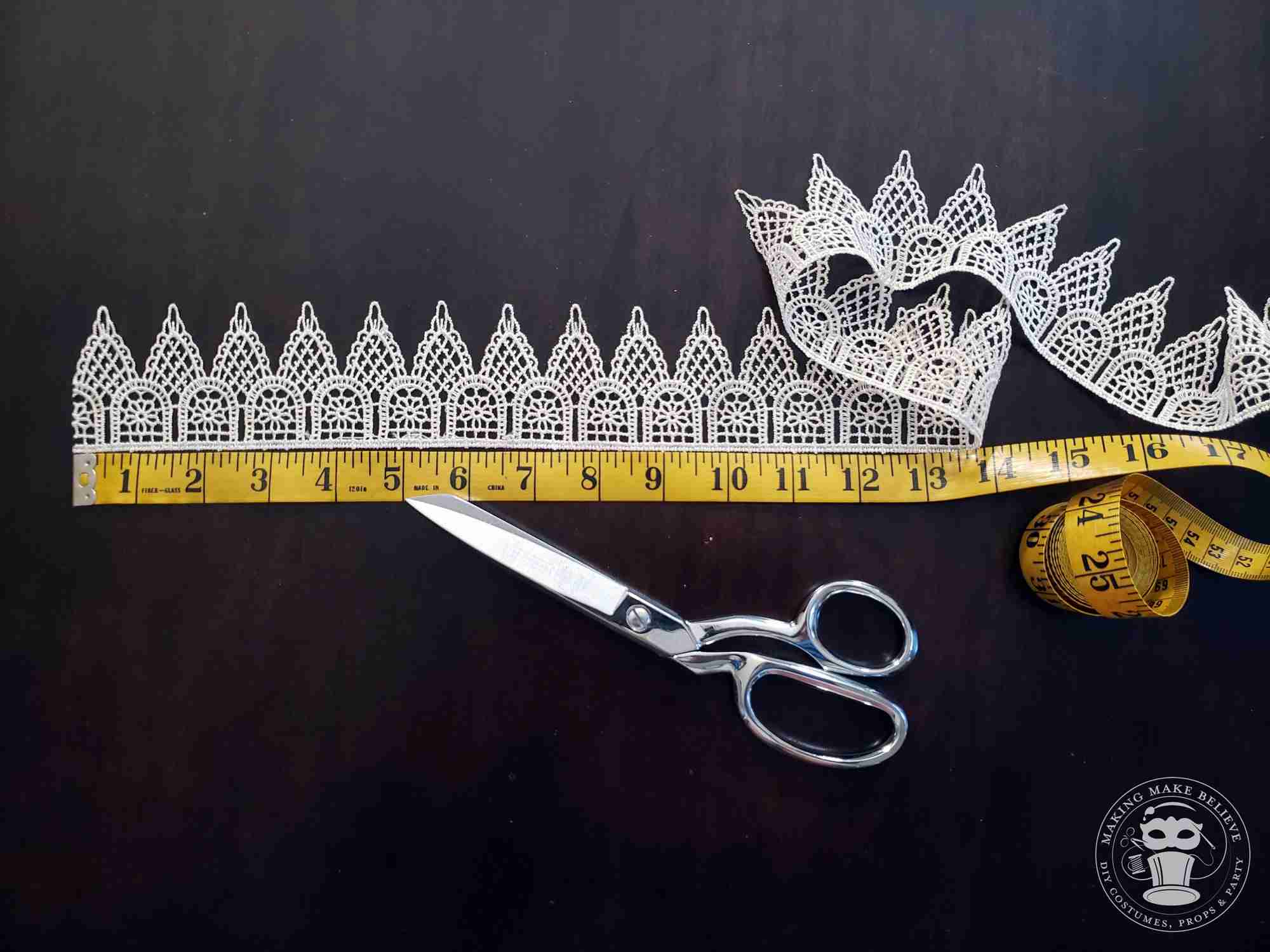 Lace with tape measure and scissors.