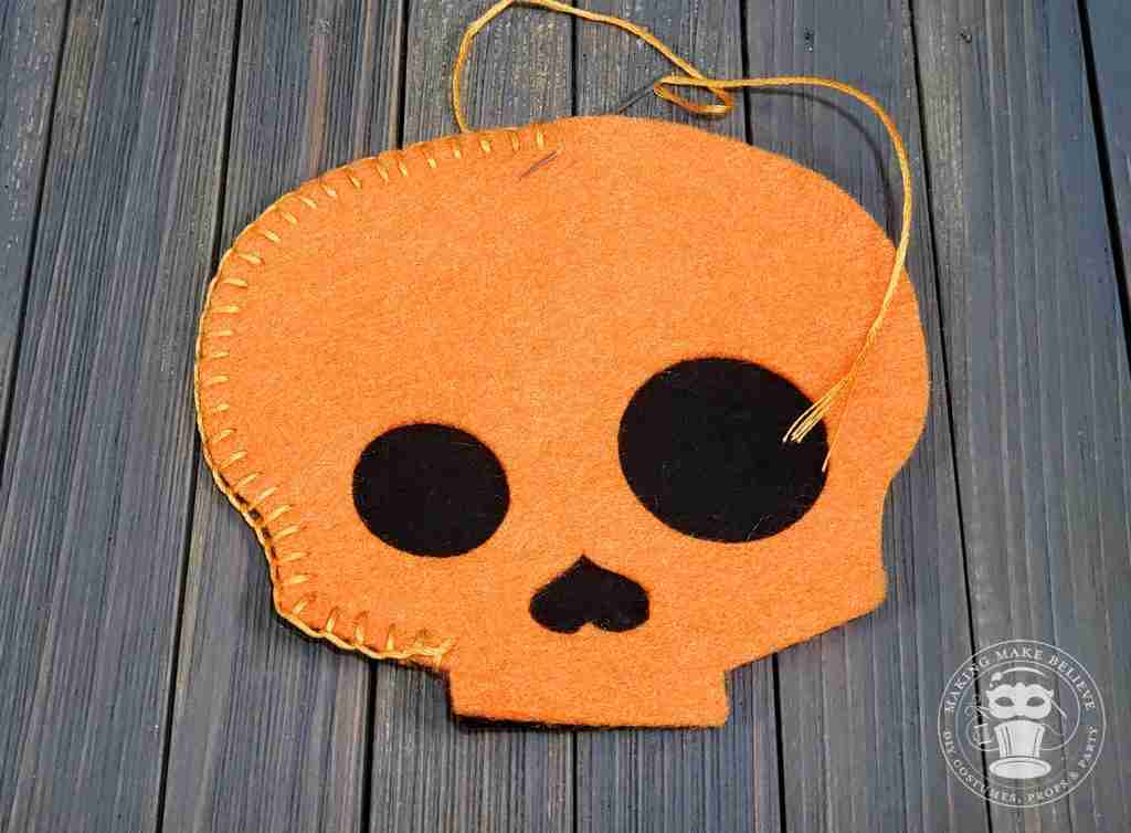 Stitch skull front to base