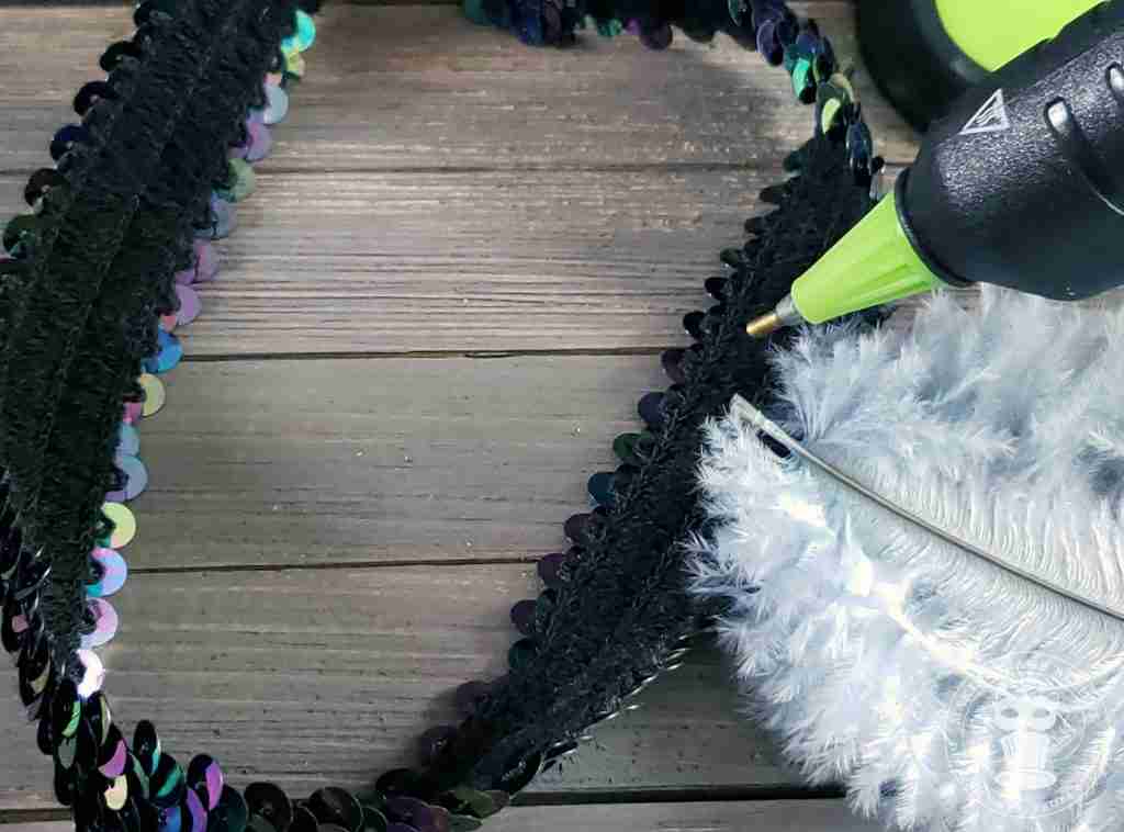 Attach feather
