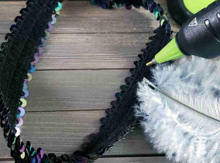 Attach feather