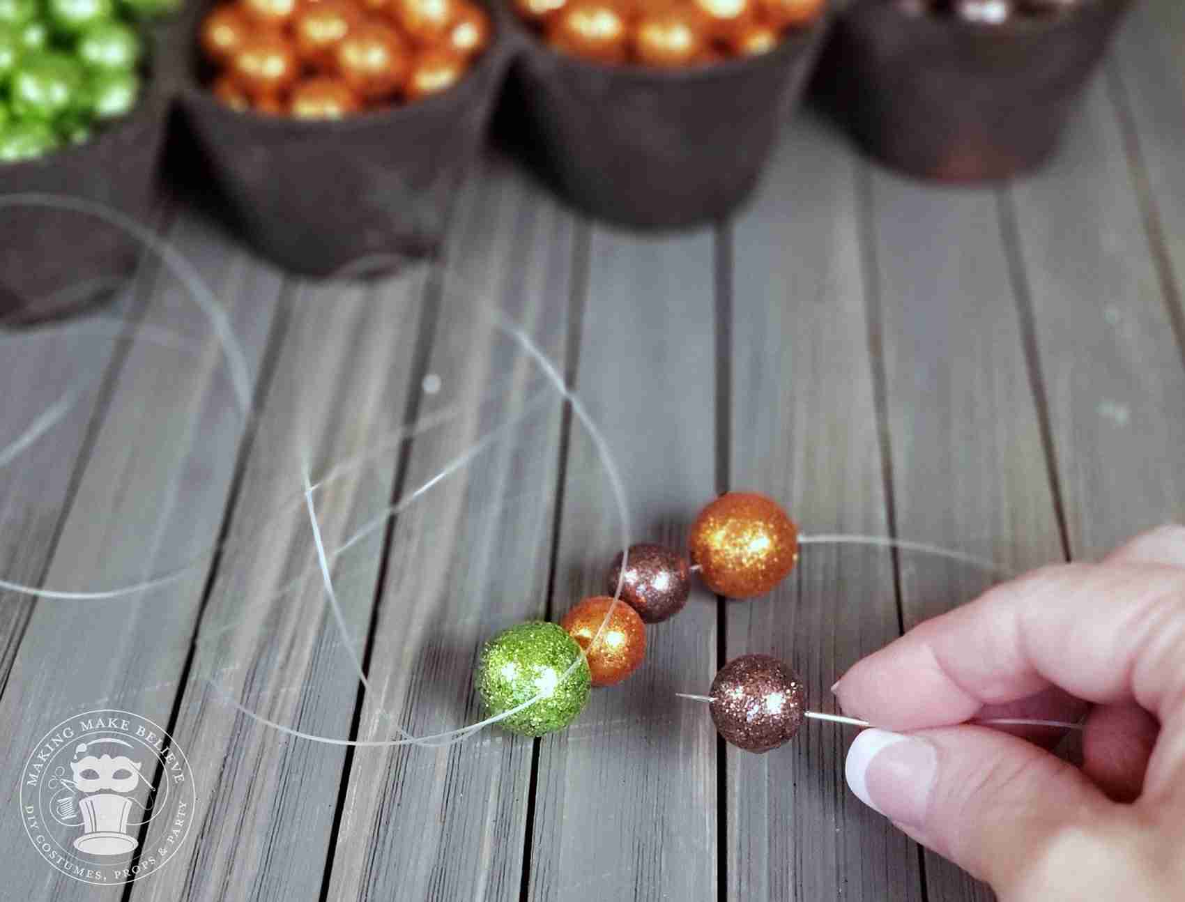 Continue adding balls to reach the length you want