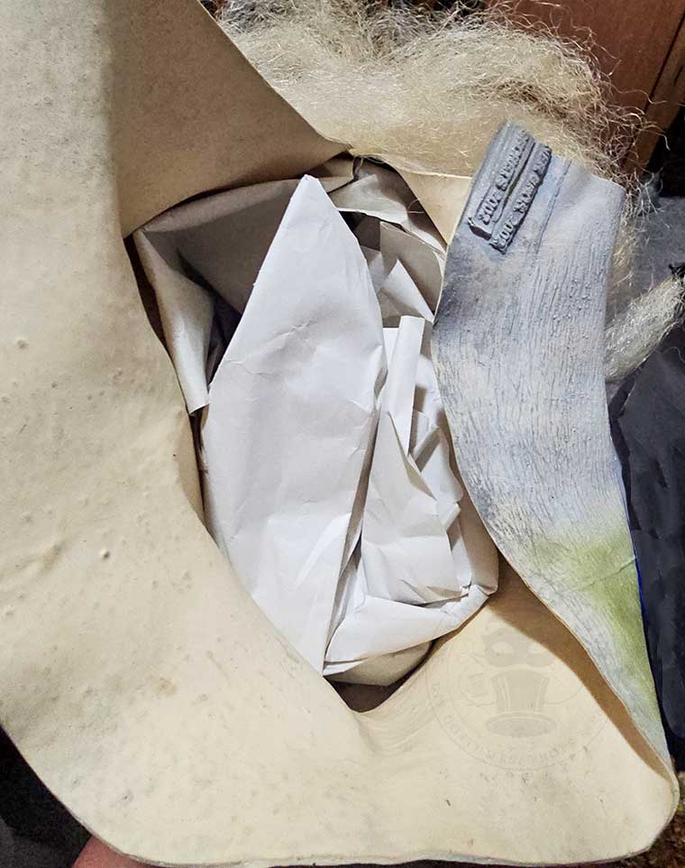 Mask stuffed with paper for storage