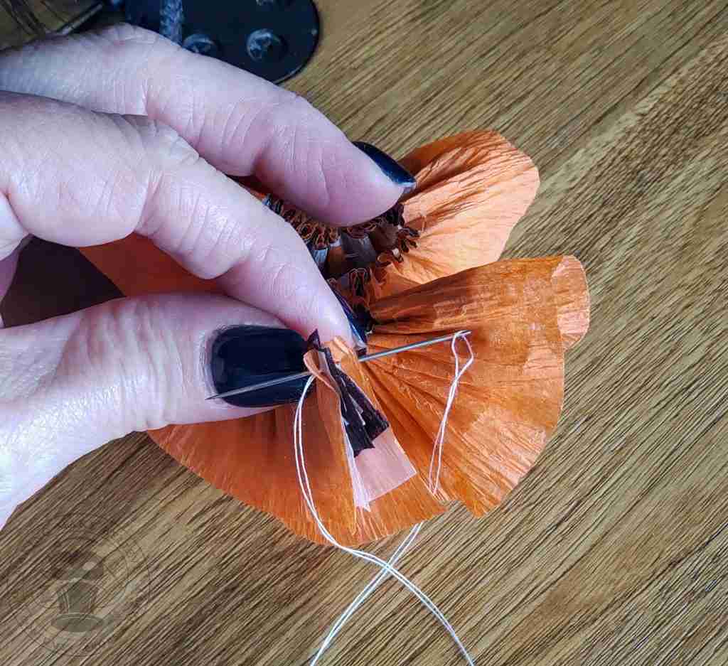 Connect ends of crepe paper collar