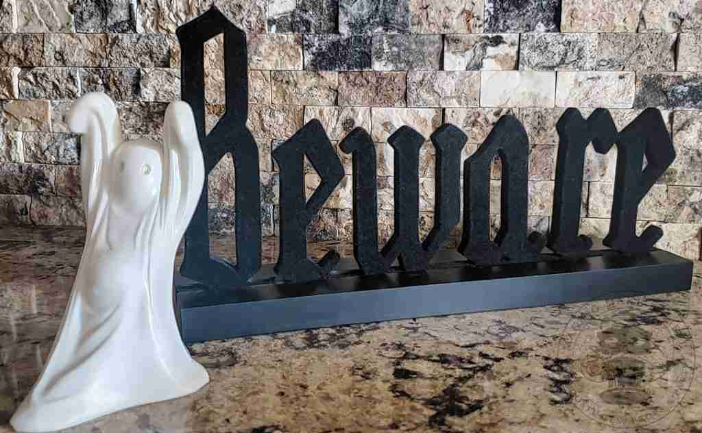 Halloween Beware sign and vintage Wilton ghost cake topper