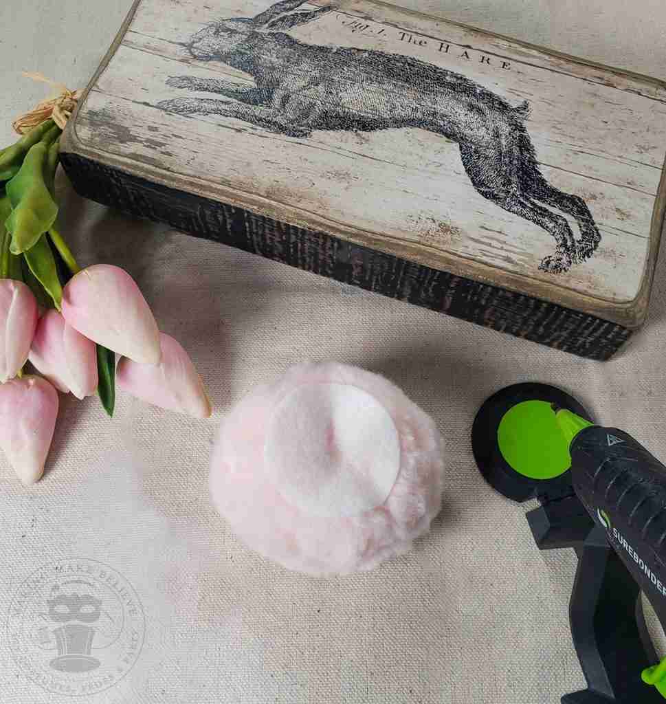 Hot Glue Felt To Pom For DIY Fluffy Bunny Tail