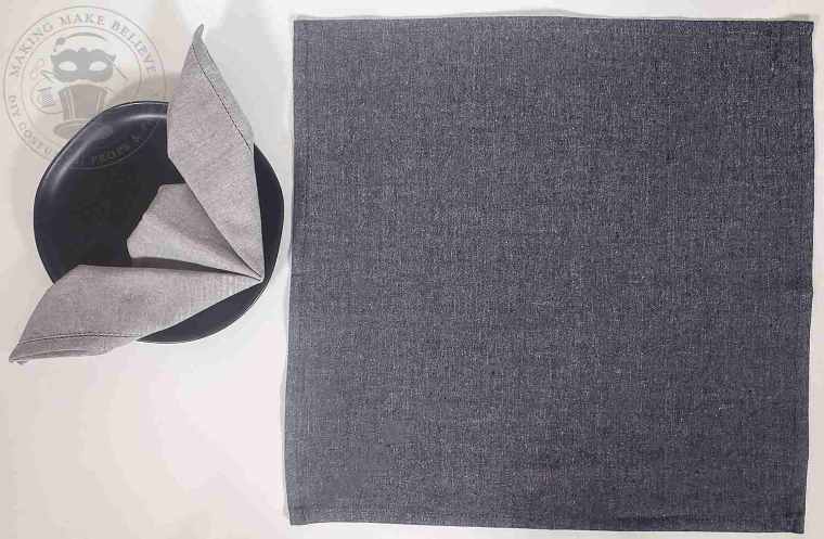 Iron napkin flat to remove folds and creases