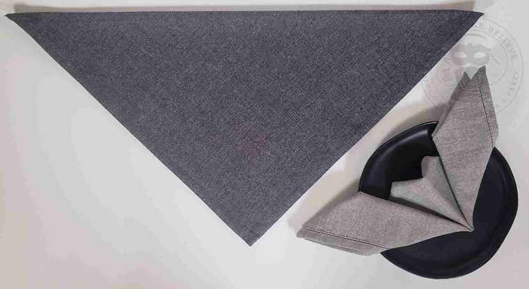 Fold napkin into triangle