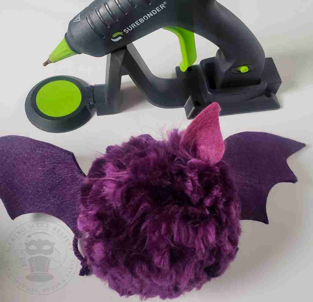 Glue Ears To Pom