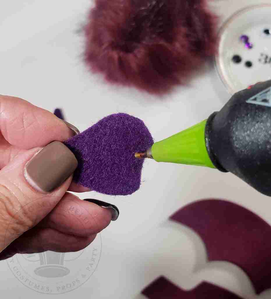 Add Glue To Bottom Center of Ear