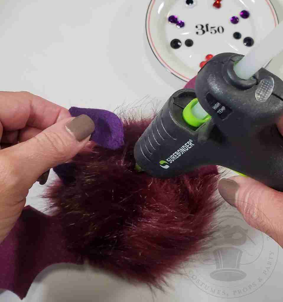 Glue Ears To Pom