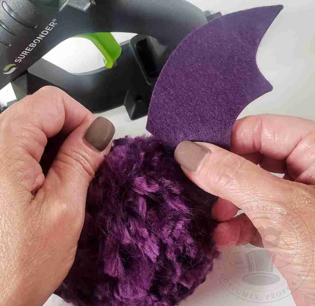 Glue Wings To Pom