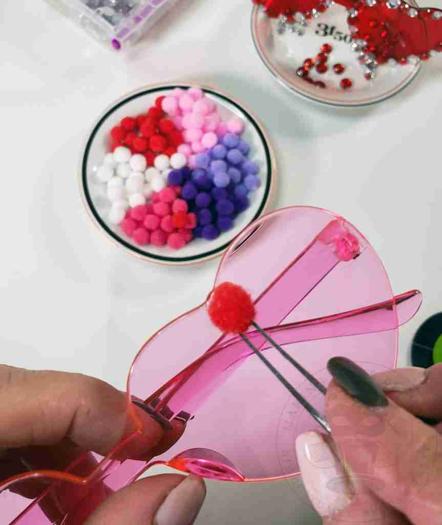 Glue Poms To Valentine Glasses