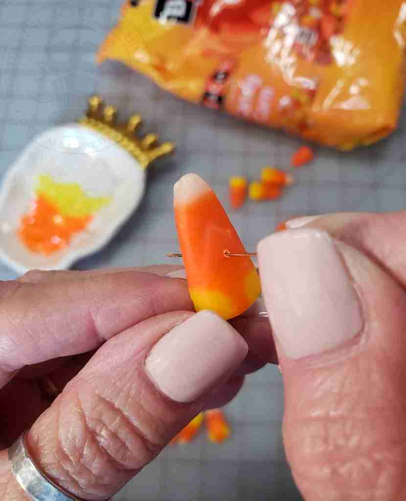 Poke Hole in Candy Corn with Pin