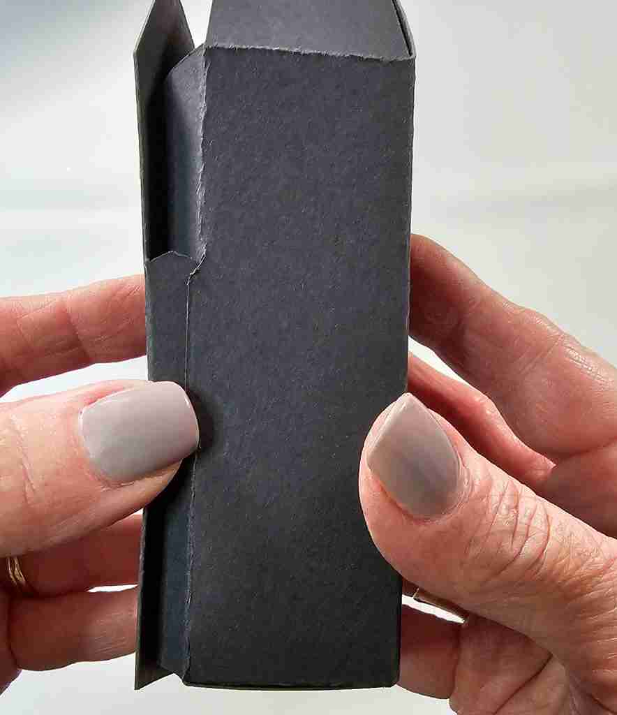 Close Lid and Insert Tab Into Slot