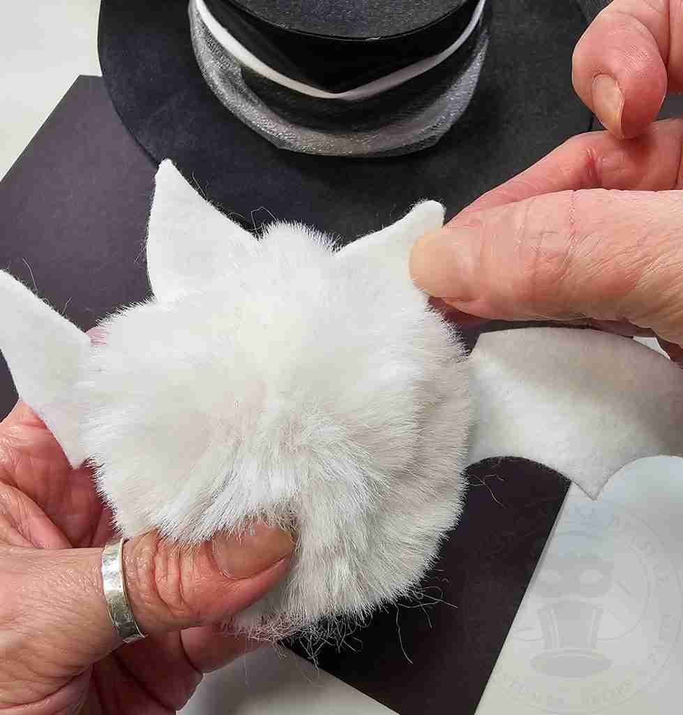 Glue Ear To Pom