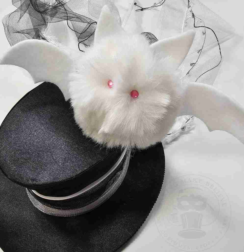 Secure Pom Bat To Vampire Hat
