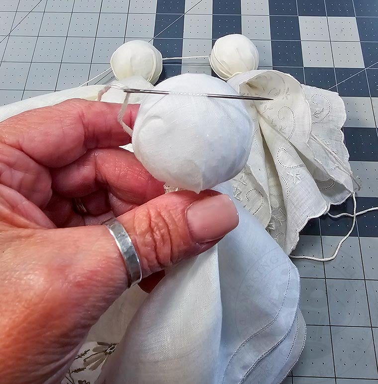 String Hankie Ghosts Onto Embroidery Floss