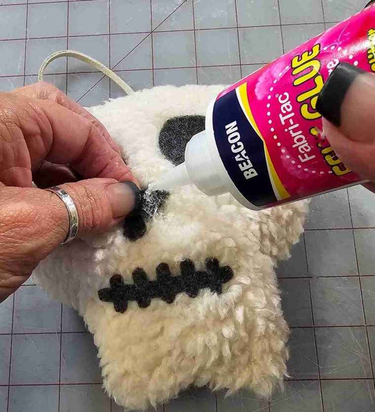 Glue Features onto Skull Stuffie