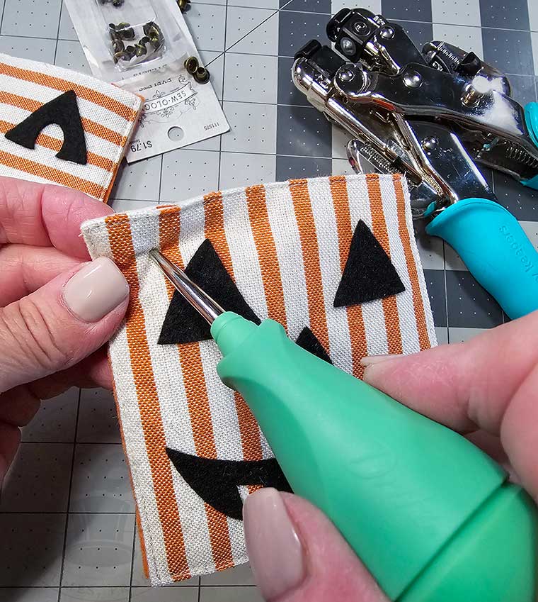 Make holes at upper corners of both sides using an awl punch