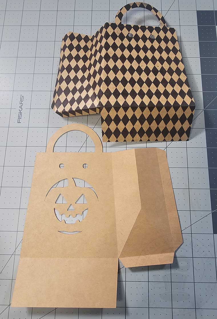 Fold sides of Halloween treat sack inward