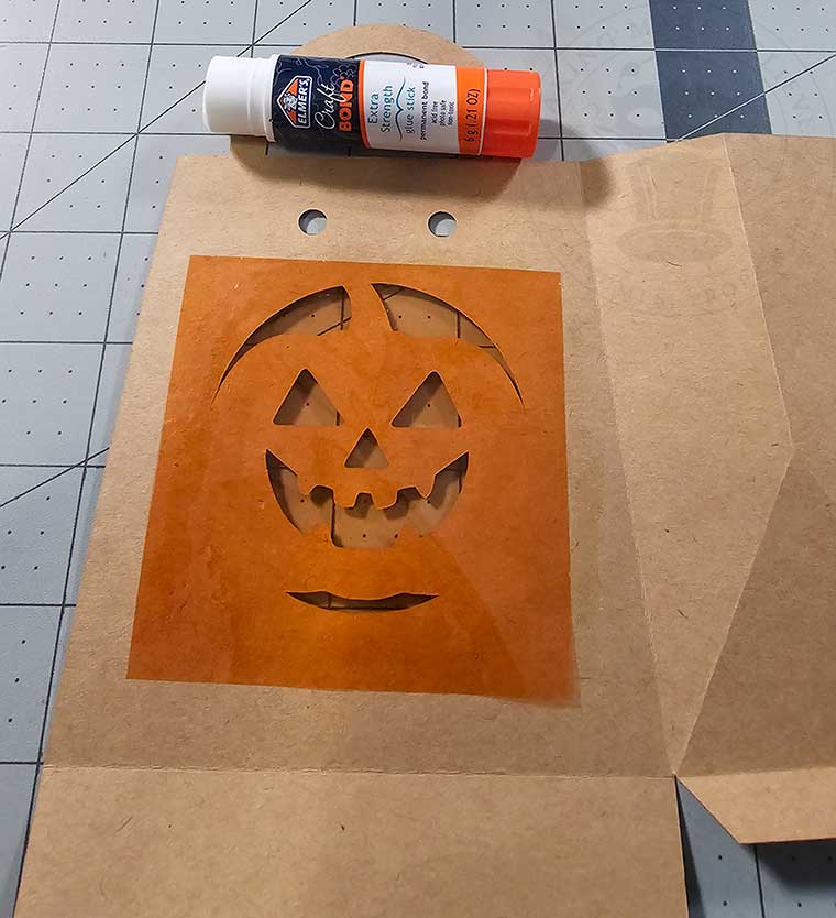 Add cellophane behind cutout