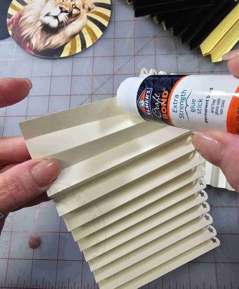 Glue folded sections together