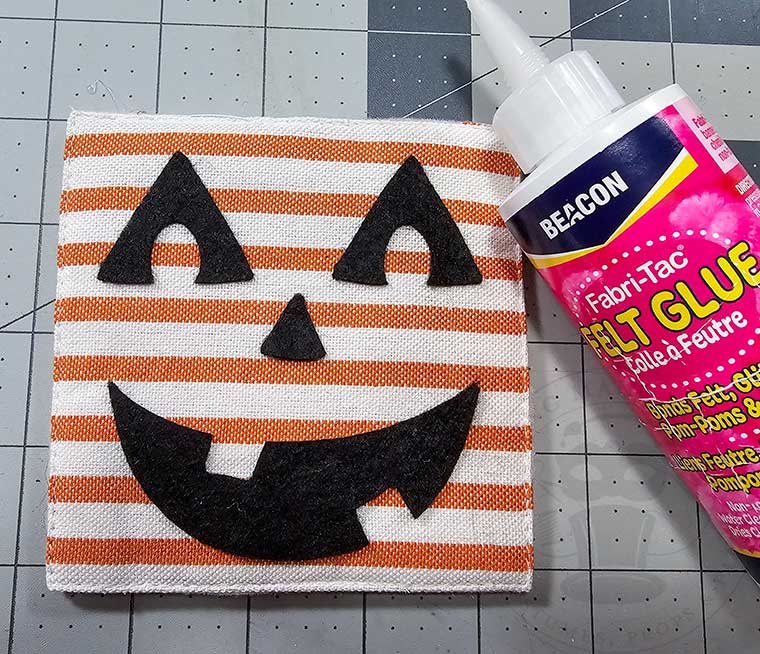 Jack face glued onto coaster