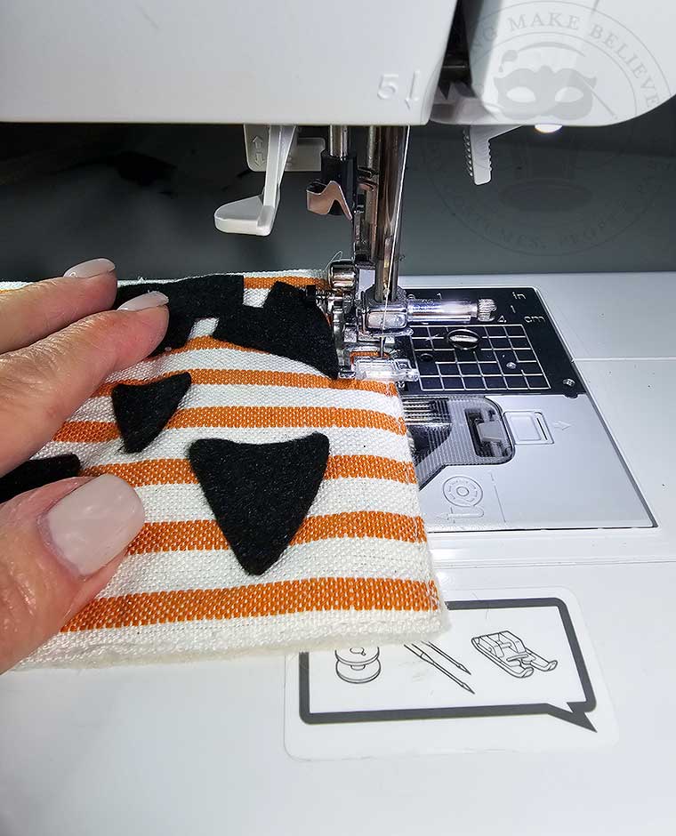 Optionally stitch backing to coaster