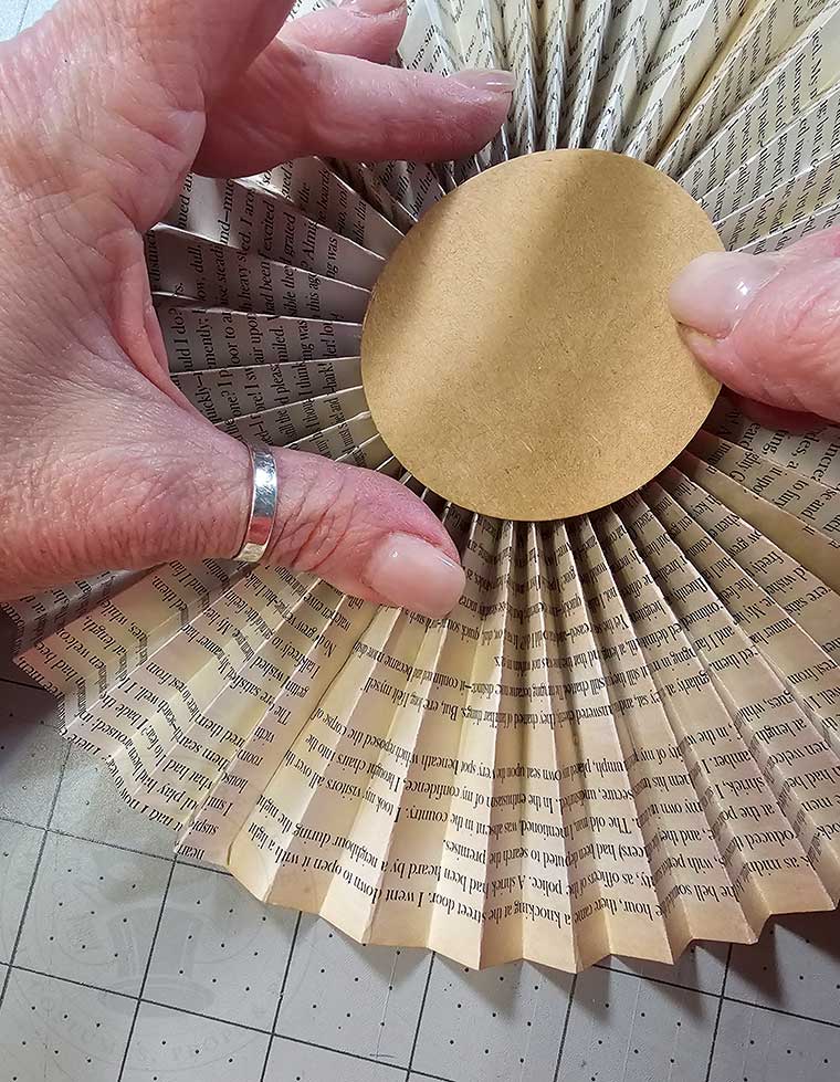 Hot glue cardstock circle to center