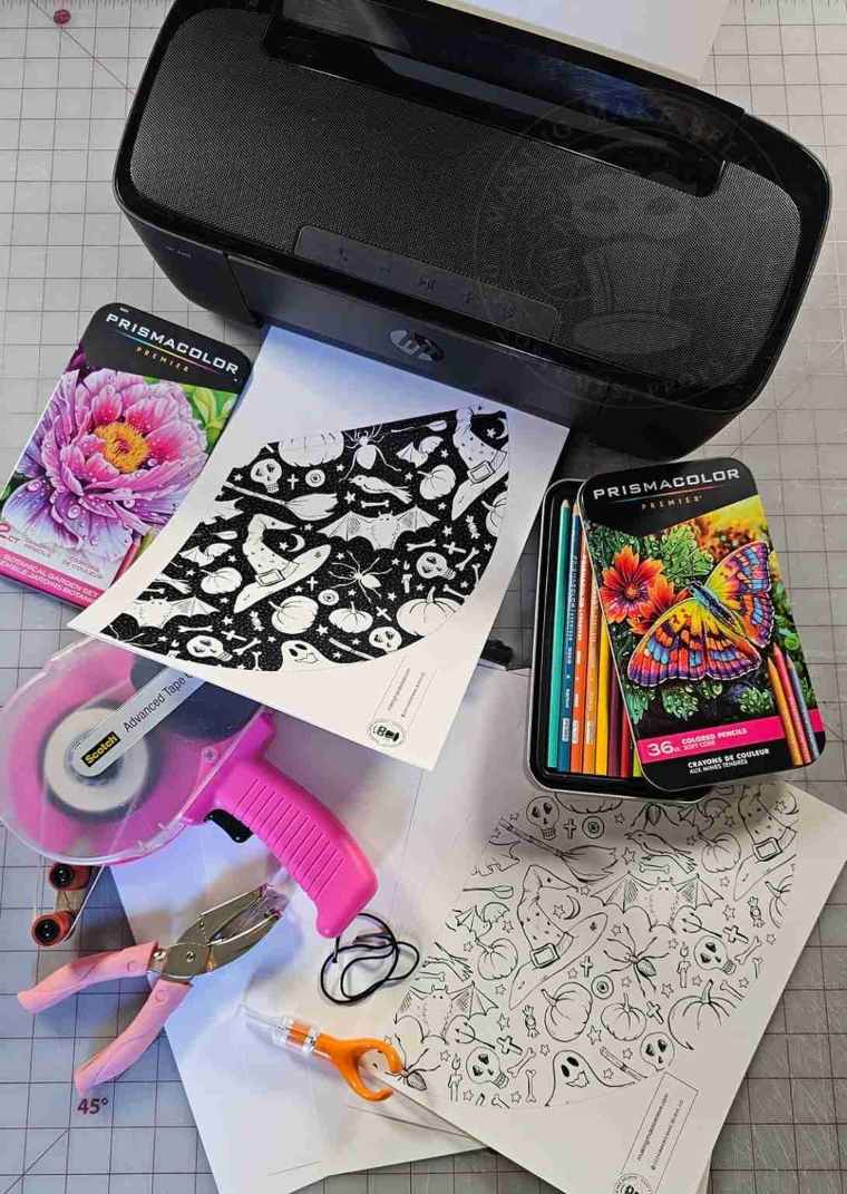 Supplies to make hand-colored Halloween party hats