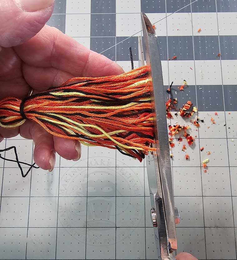 Trim the tassel ends evenly