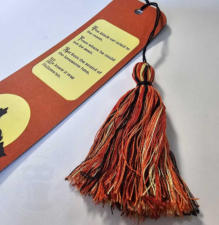 Attach tassel to bookmark