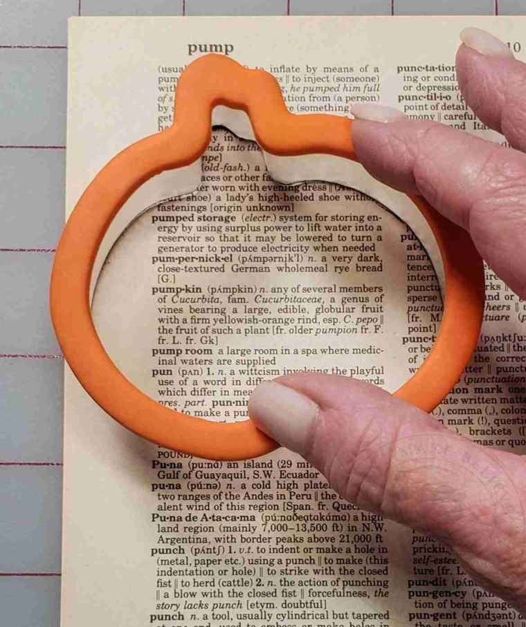 Stamp cookie cutter onto page around the definition selected