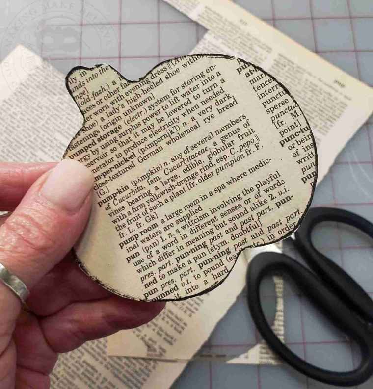 Halloween icon cut from old book page