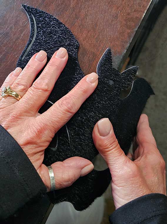 Form mask into a slight curve to fit to face