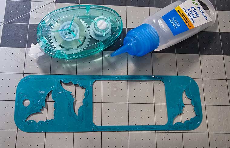 Apply adhesive to back of top layer