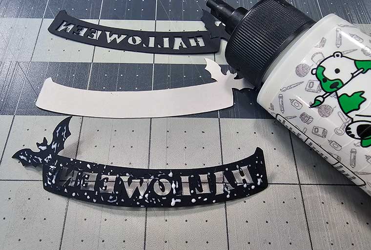 Glue to assemble Halloween cupcake picks