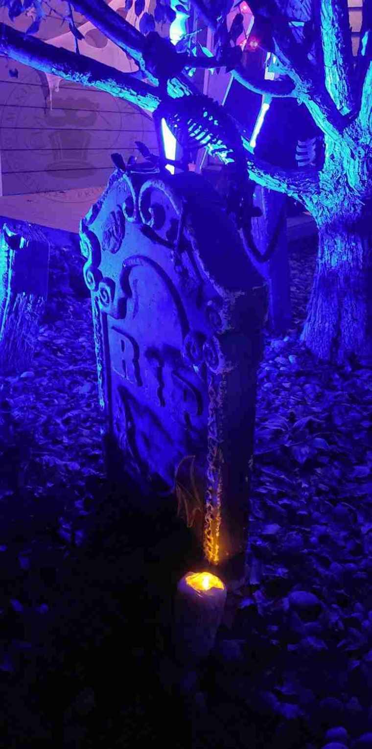 RIP tombstone with candle