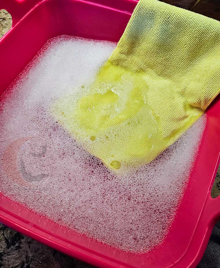 Fill basin with lukewarm water and mild soap