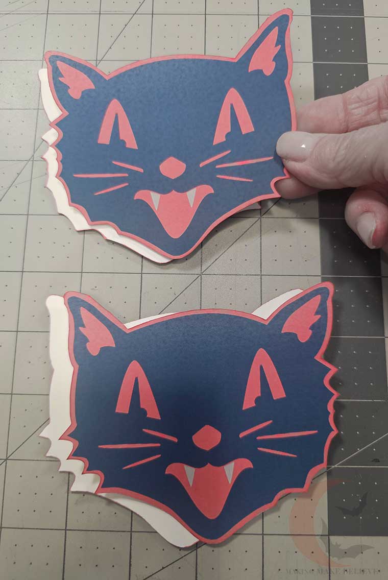 Pair up cat faces so you have a front and a back
