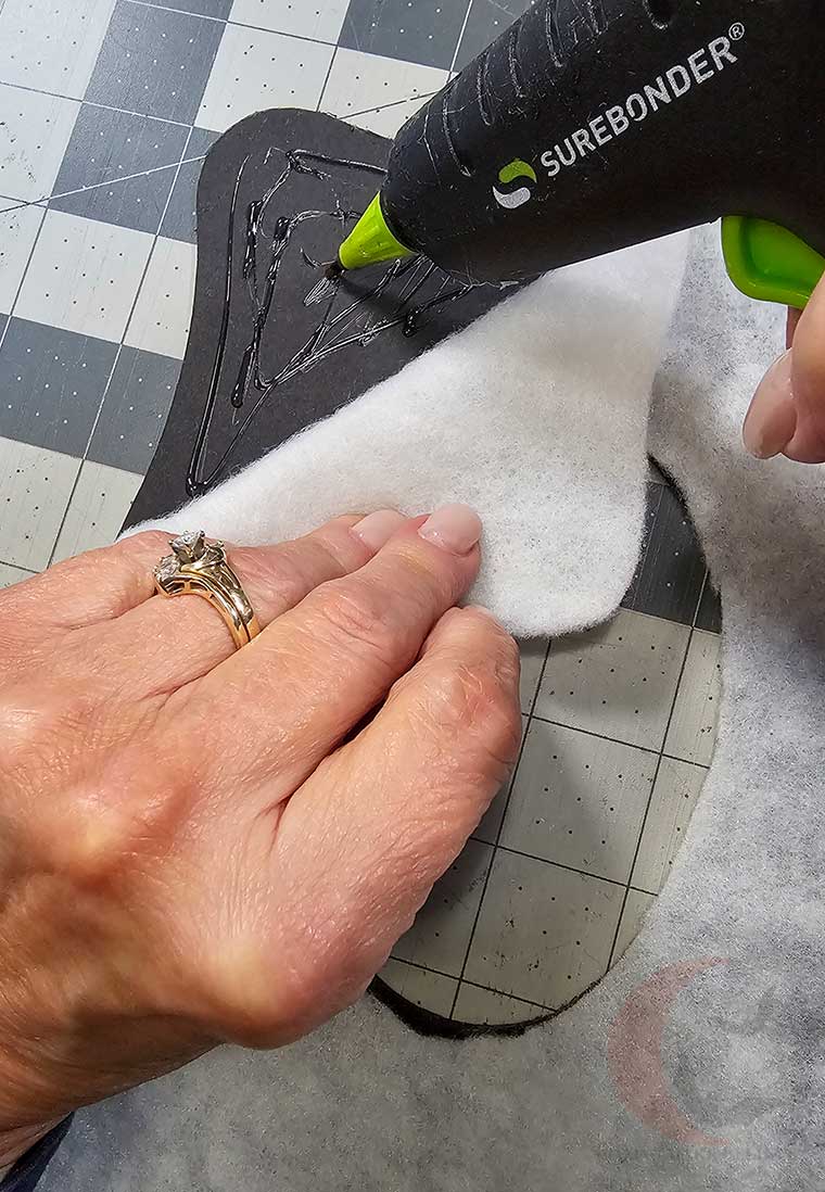 Tack batting to cardstock with hot glue