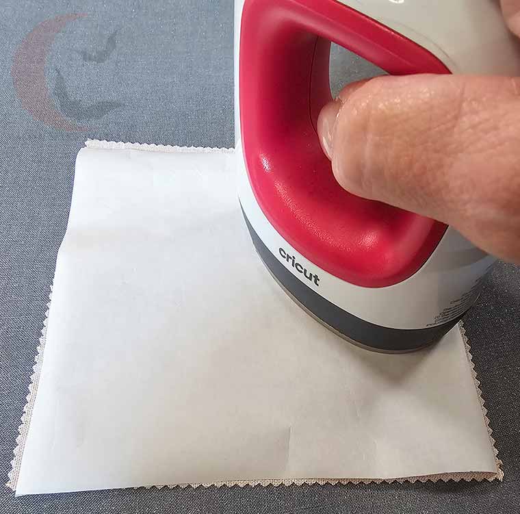 Iron Wonder Under onto fabric square