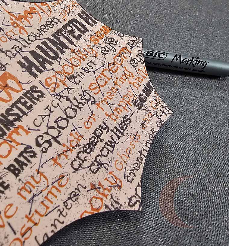 Draw stitch line with fine tip marker
