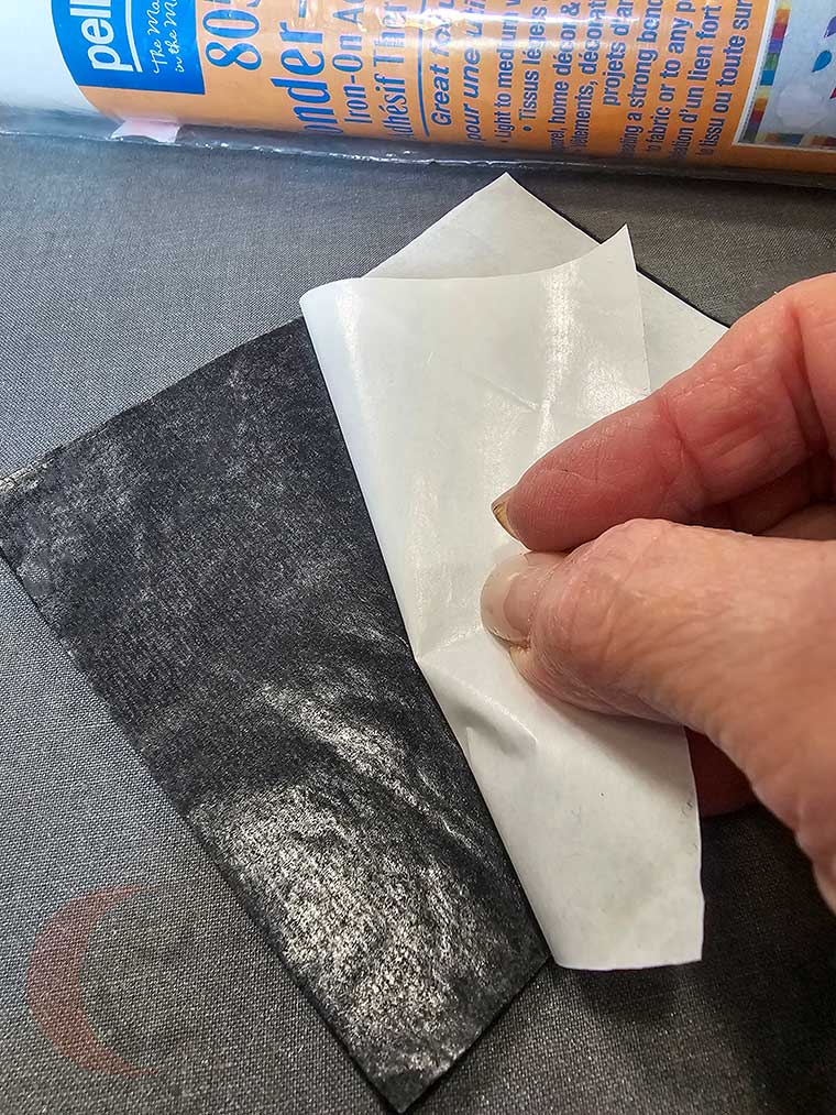 Remove paper backing from Wonder-Under