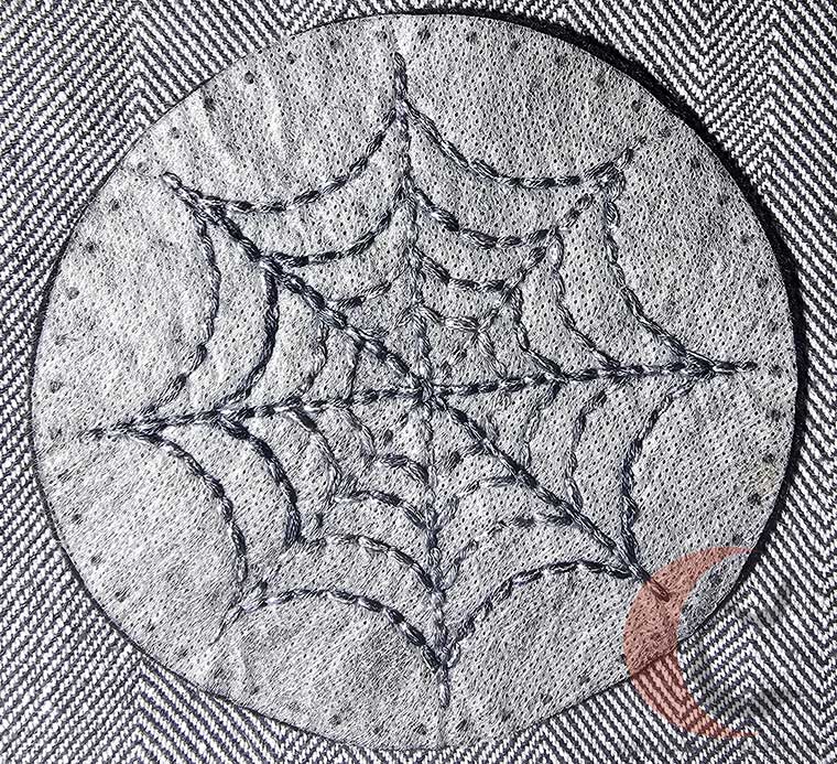 Spider web spirals stitched