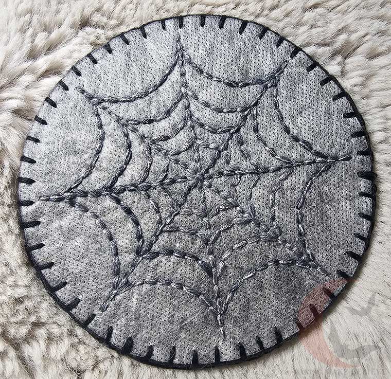 Spider web coaster blanket
