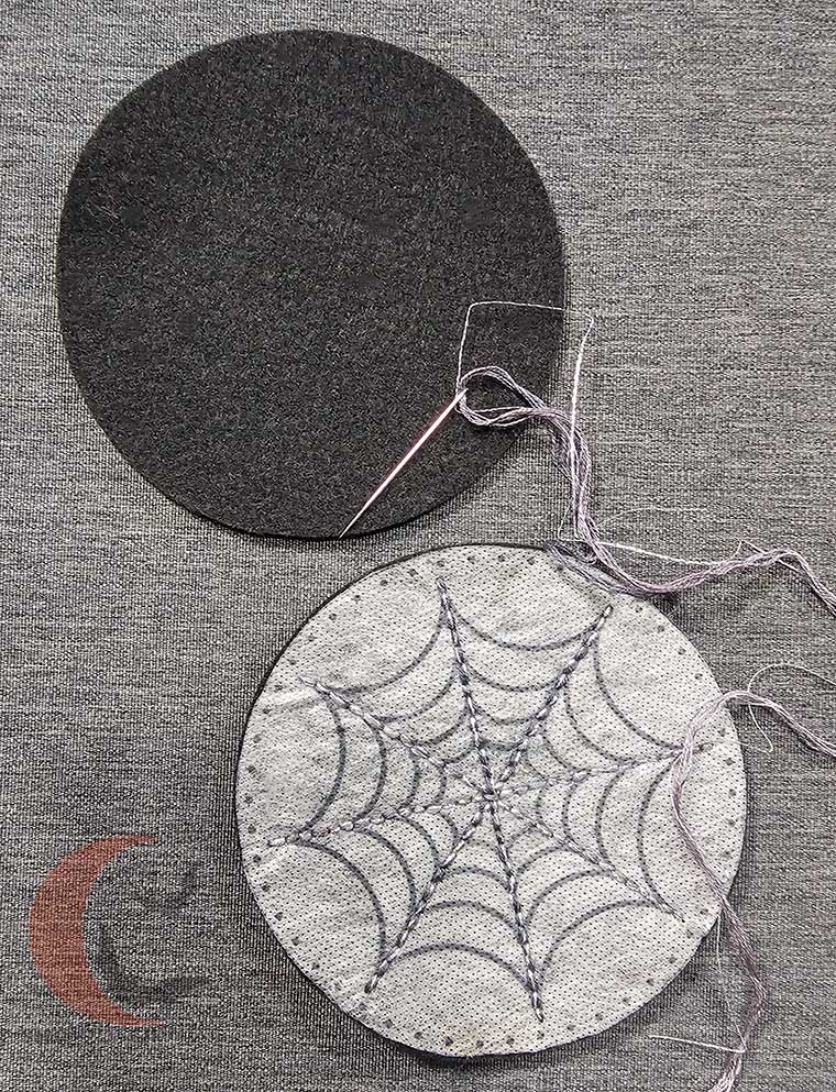 Anchor sections of spider web stitched